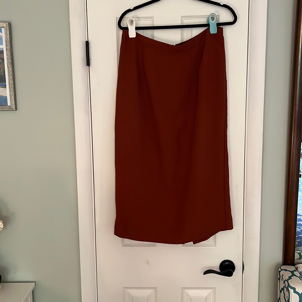 Burnt orange straight midi skirt.